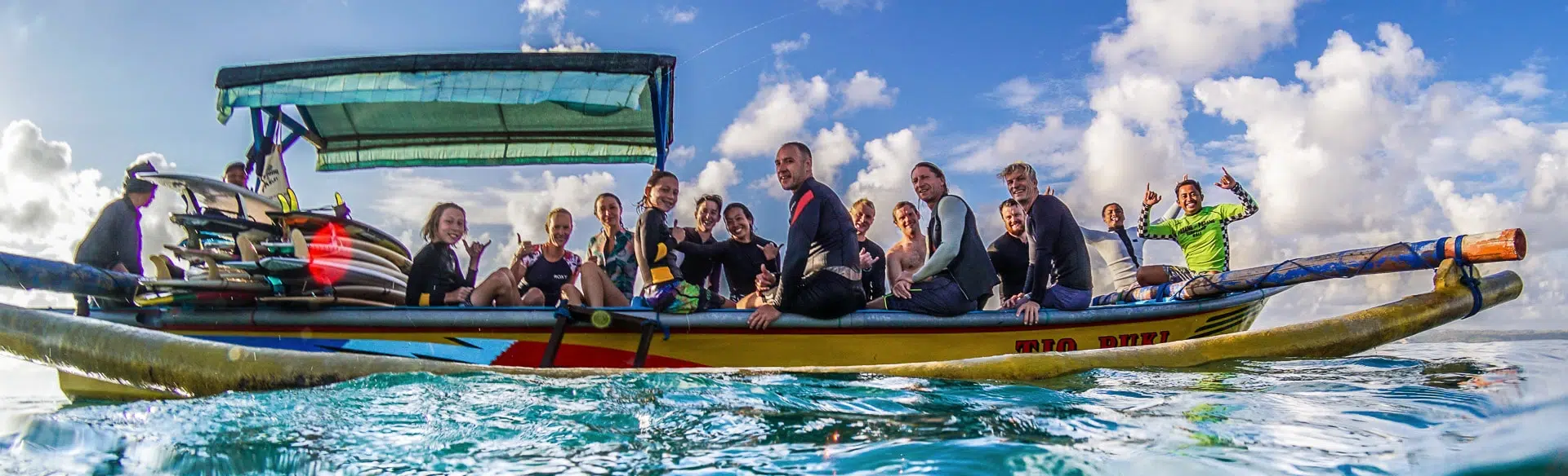 Surfers in the boat from the water