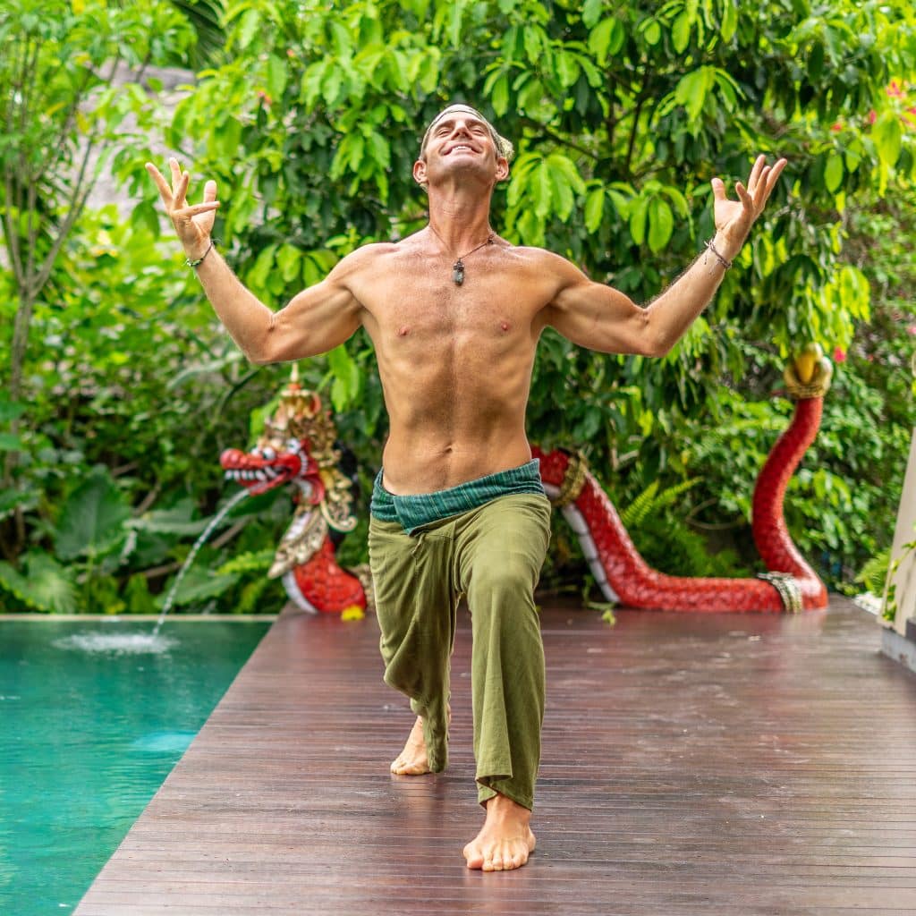 Oliver leading poolside yoga at PPSC