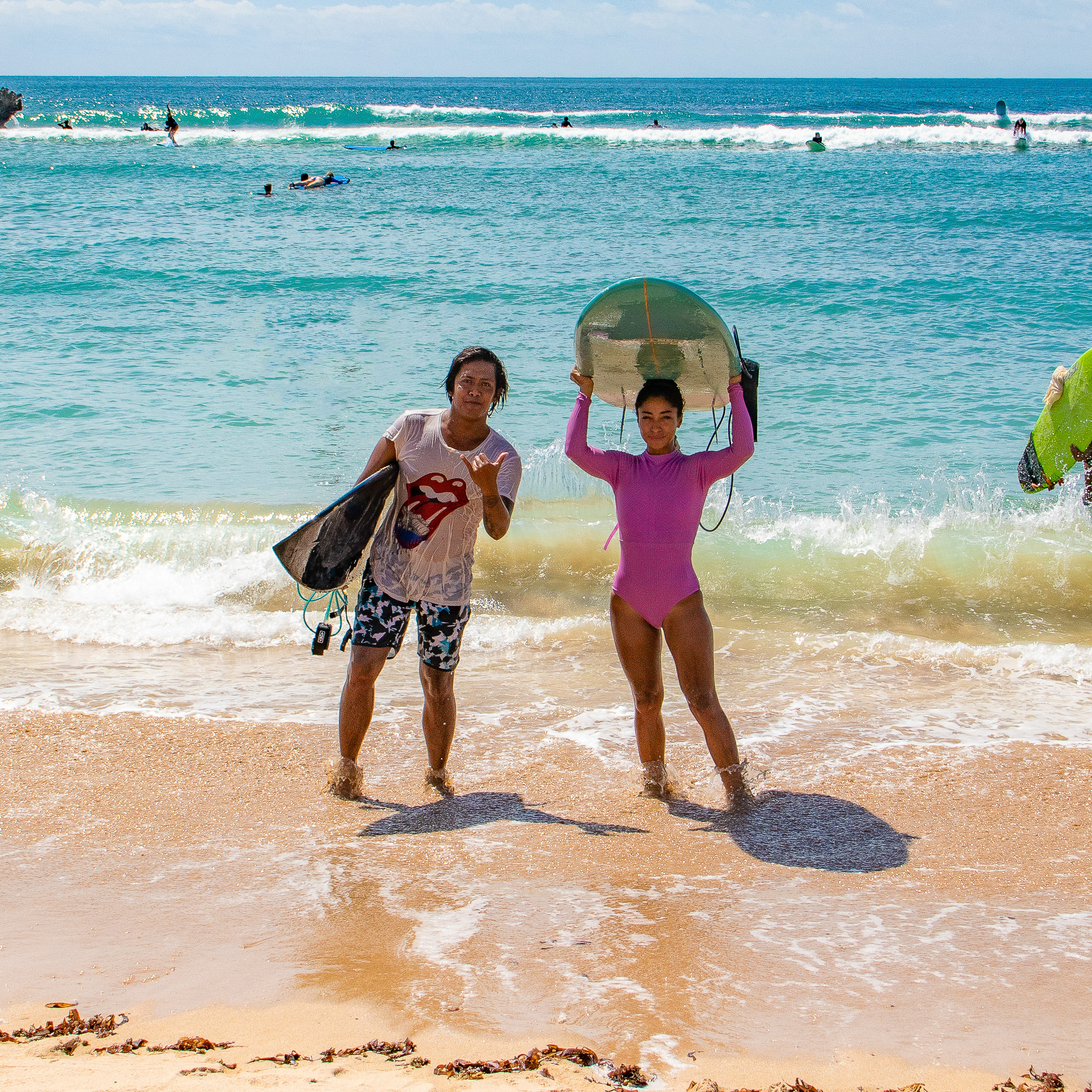 Instructor and student at a private surf lesson.