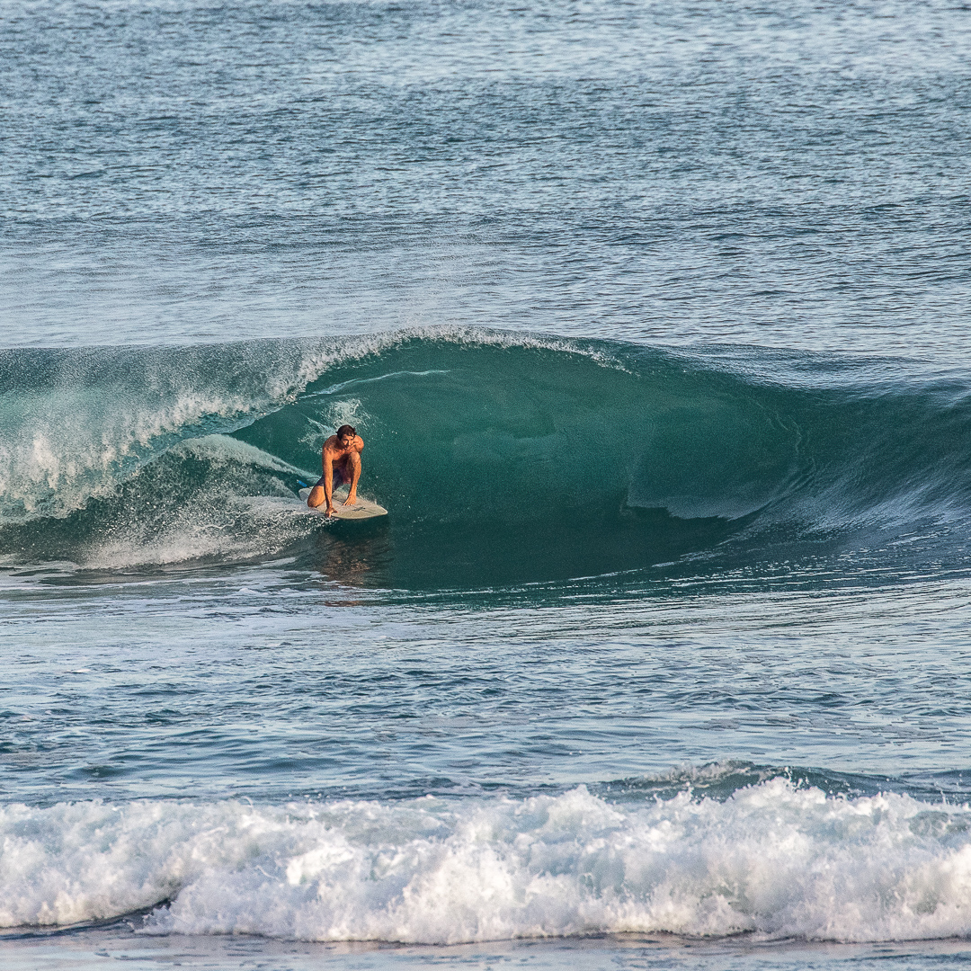 Surfer in a barrel at Padang.