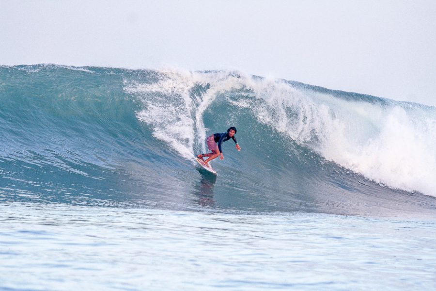 Surfer riding a wave at Airport Rights.