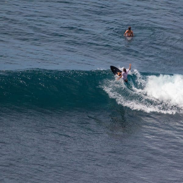 Surfer riding a wave at Nyang Nyang.