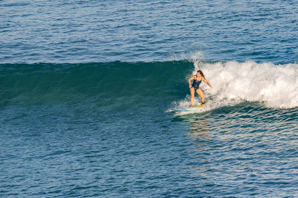 Female surfer small wave Bingin rights