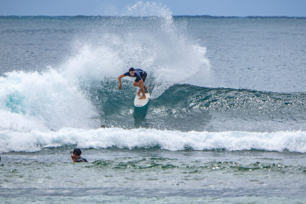 An advanced surfer on a backside snap at Blackstone.