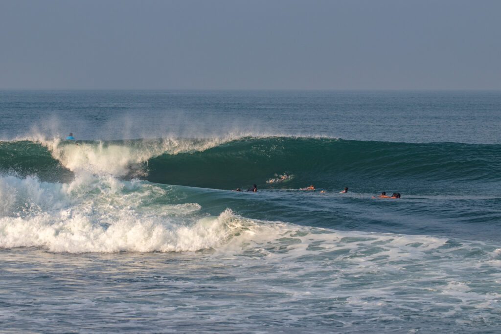 Big, barrelling wave at Echo Beach Left.