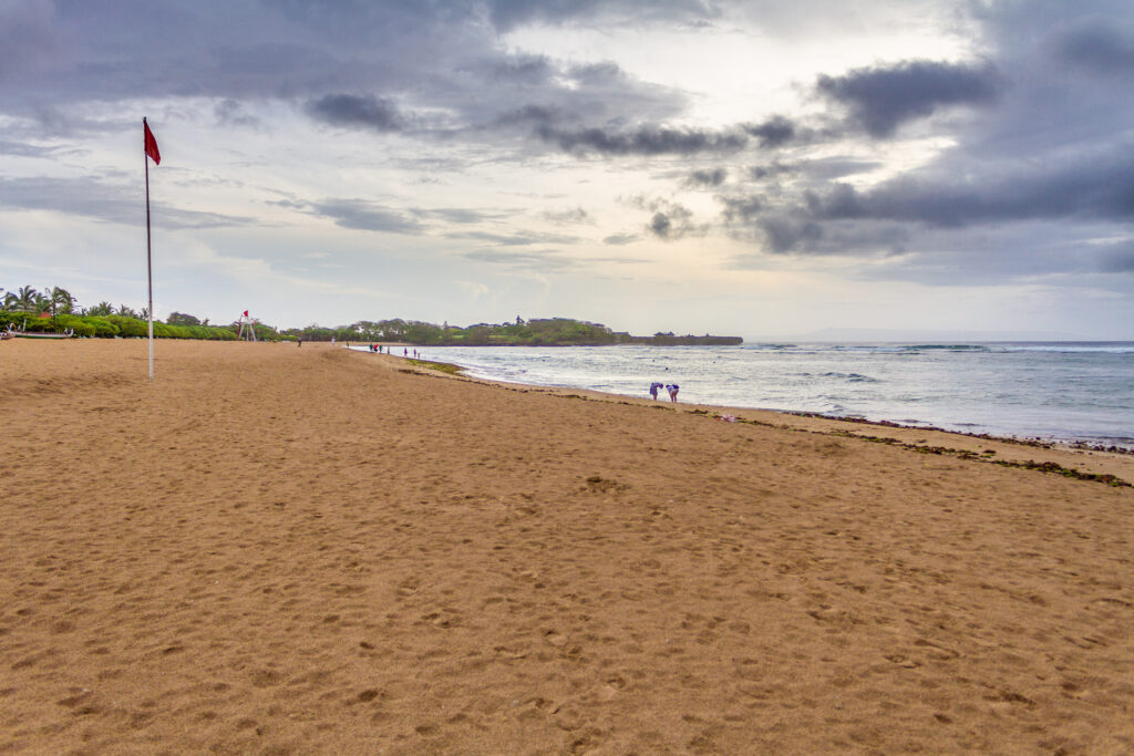 The expansive stretch of beach at Mengiat.