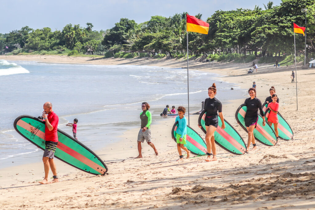 Beginner surf lessons at Pantai Muaya.