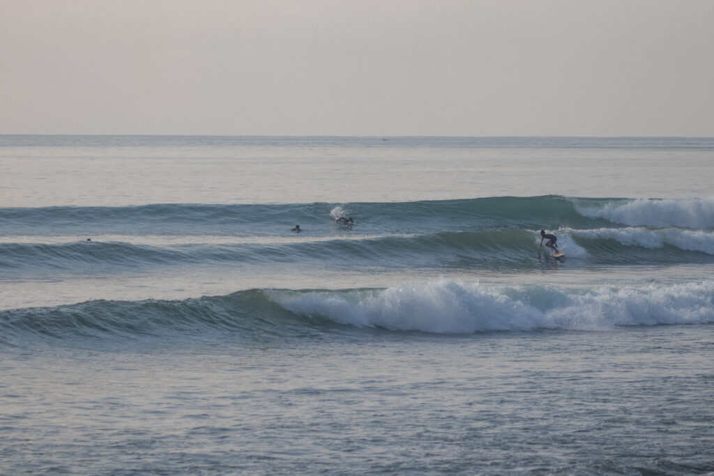 Local groms surfing Jasri.